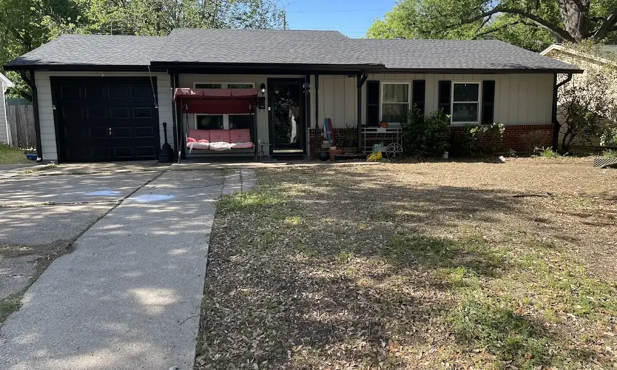 Asphalt Shingle Roof Repair crew at work on a residential roof in Oviedo